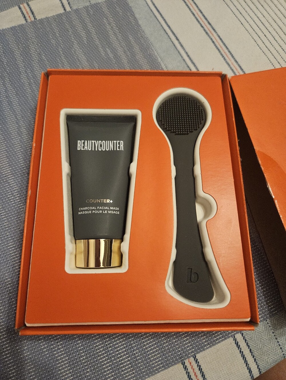 beautycounter Charcoal Skincare Mask Packaging with Gold Logo